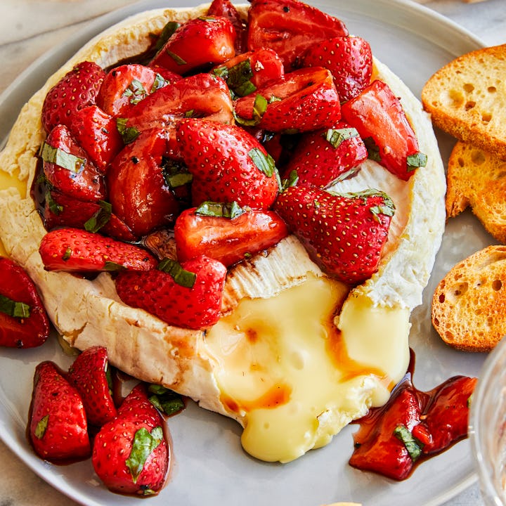 Strawberry-topped baked brie, a yummy red and white Olympics snack idea.