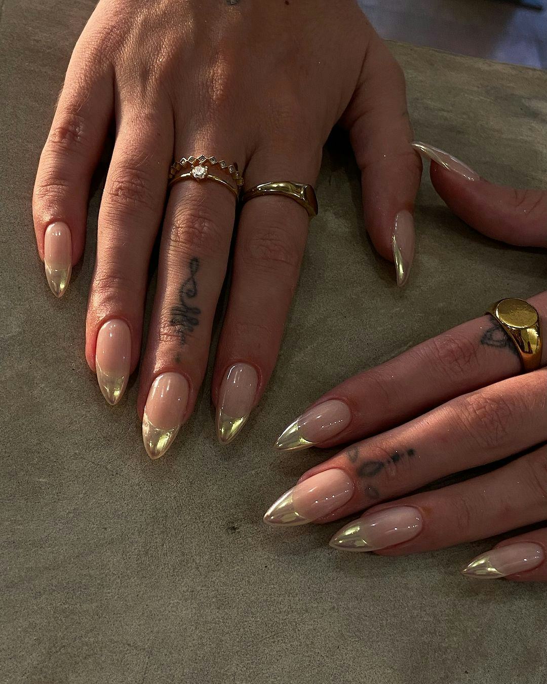 Gold chrome French tip nails are perfect for Leo season 2024.