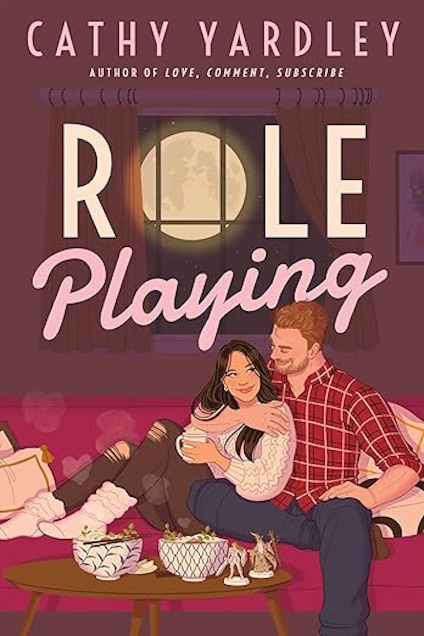 Book cover showing a couple cuddling on a sofa with snacks, titled "Role Playing" by Cathy Yardley.