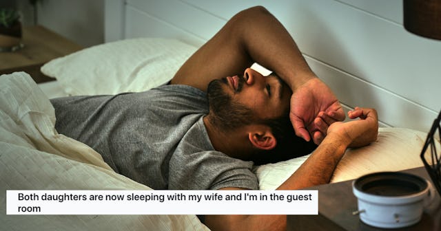 A man lying awake on a bed in a dimly lit room, looking distressed. A man on Reddit wants advice abo...