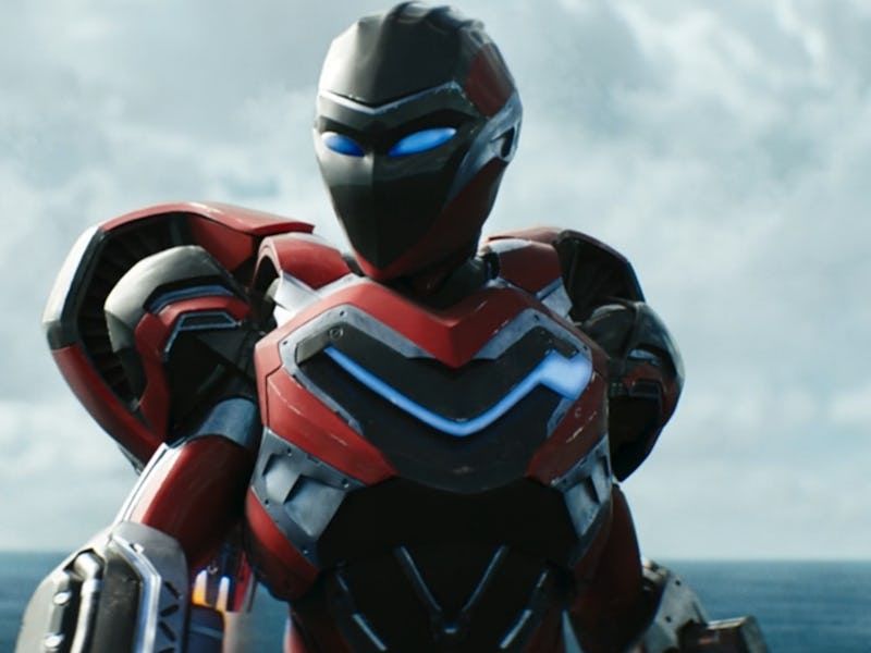 A futuristic armored figure stands confidently against a scenic ocean backdrop. The suit features sl...