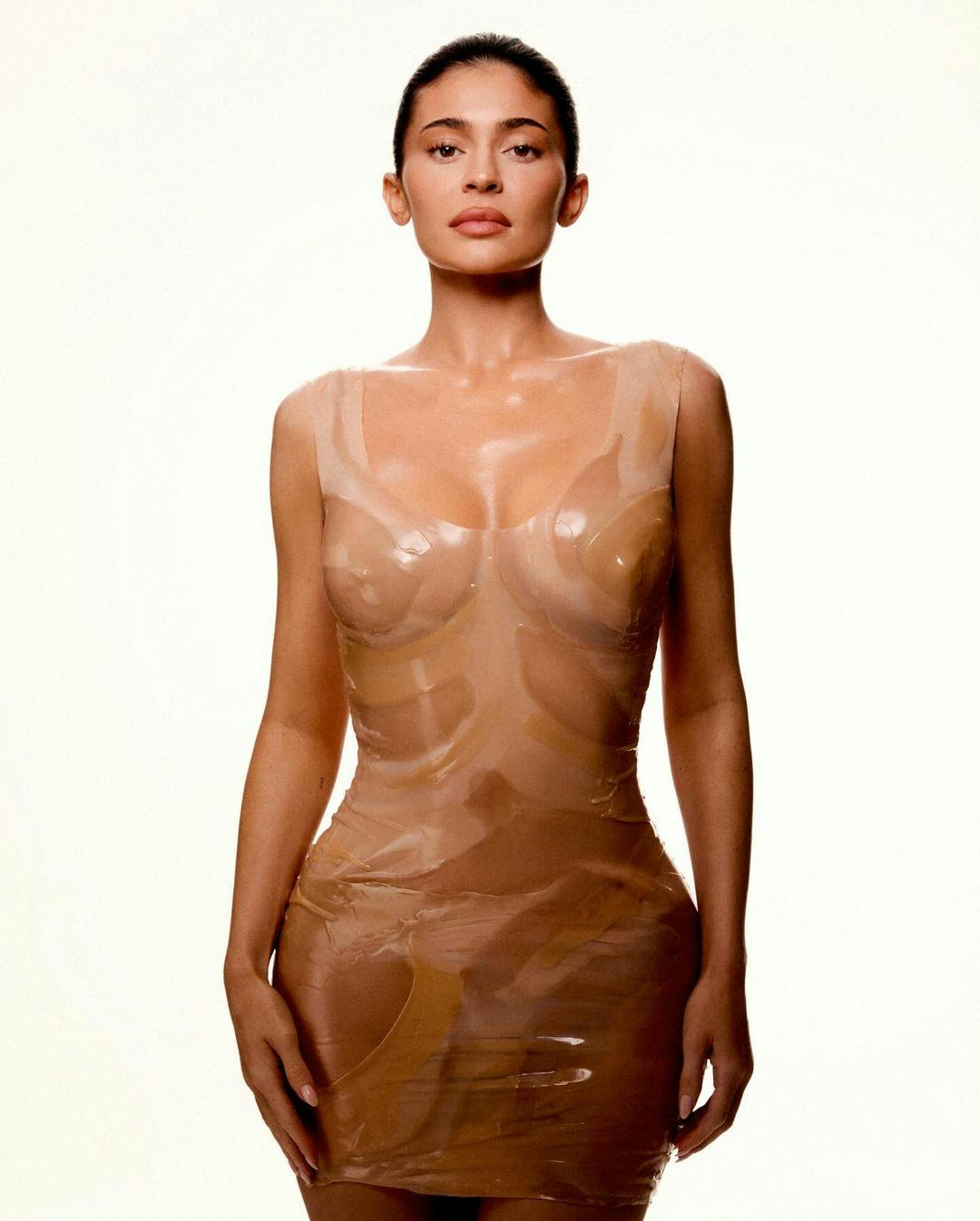 Kylie Jenner wearing Lamarche - Lab nude dress for her Kylie Cosmetics campaign.