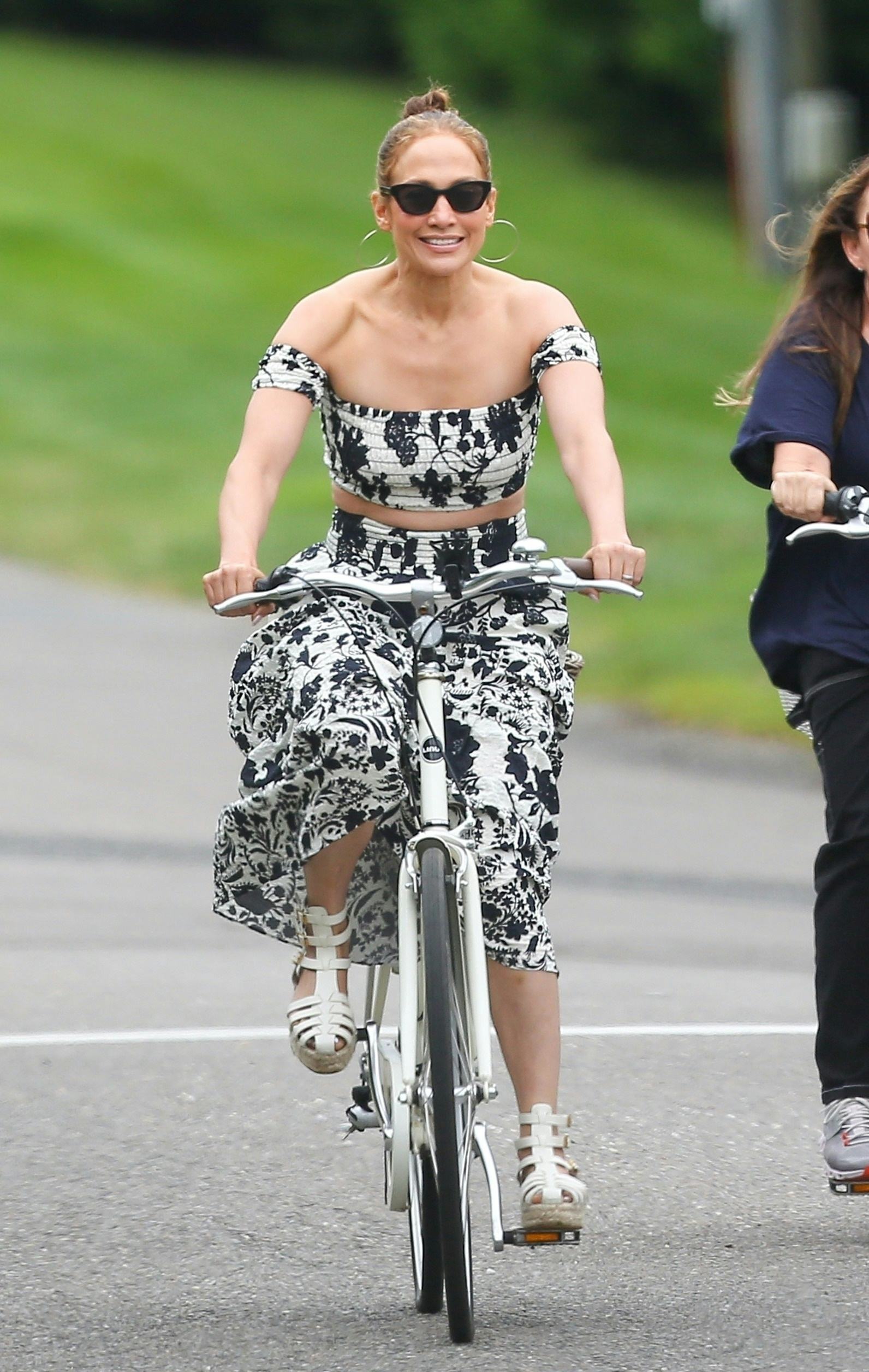 Jennifer Lopez wears a black-and-white floral top and skirt set.