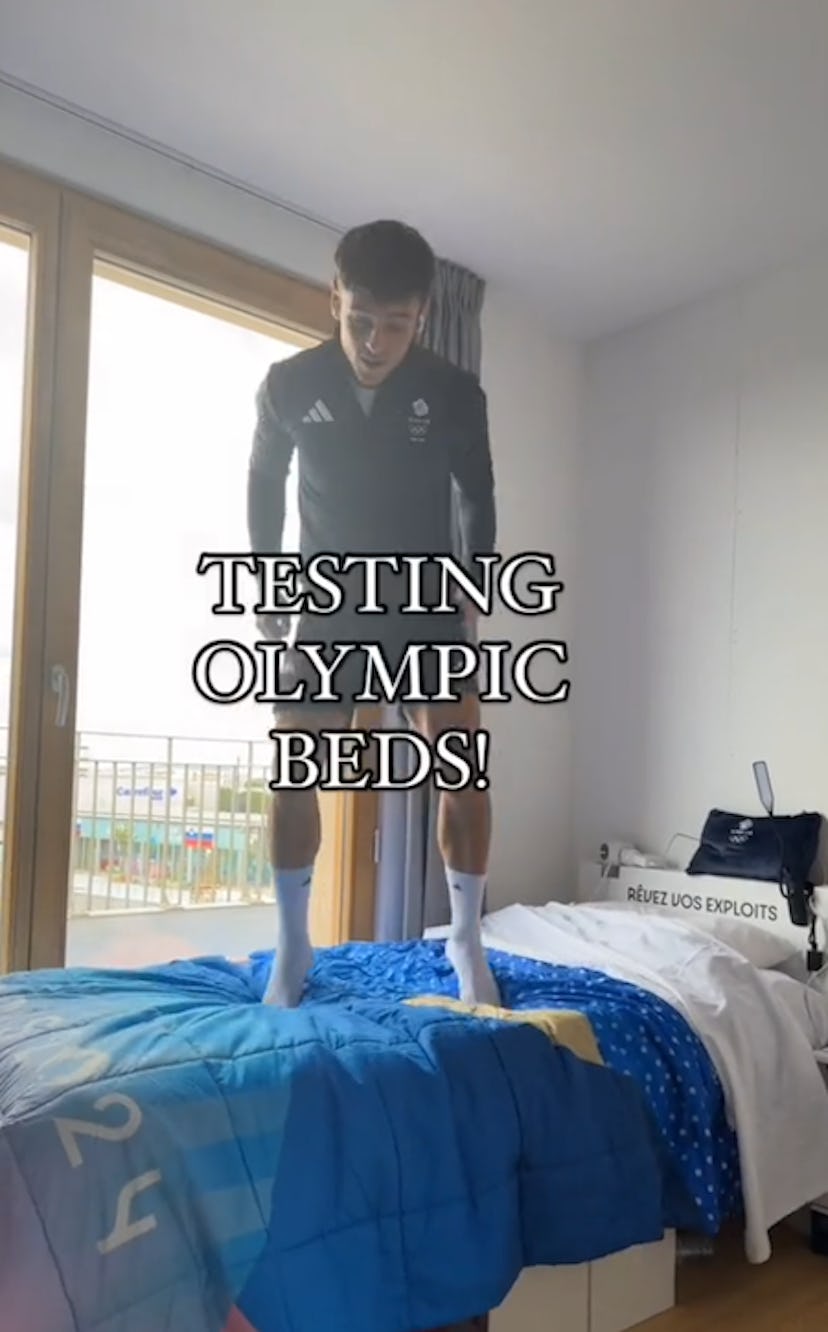 Tom Daley tests the Olympic beds.