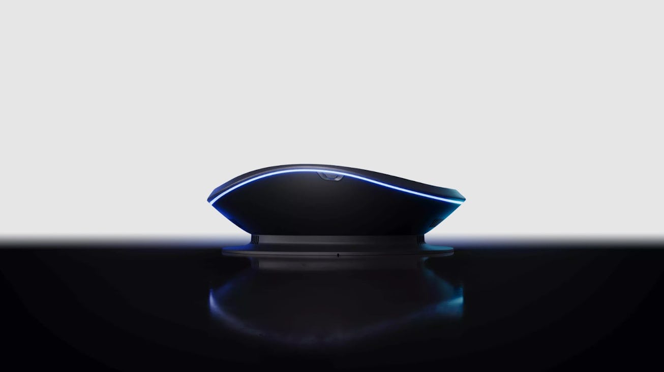 A sleek, modern wireless mouse with blue LED lights glowing around its base, set against a minimalis...