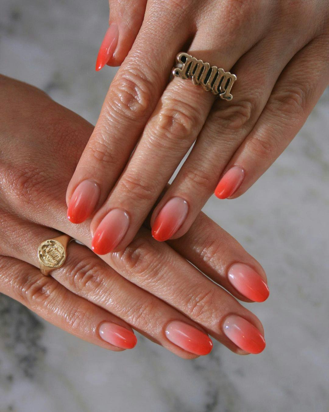 Try &ldquo;aperol spritz nails&rdquo; with orange ombré French tips.