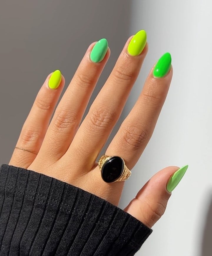 Green Skittle nails give &ldquo;brat summer&rdquo; vibes.