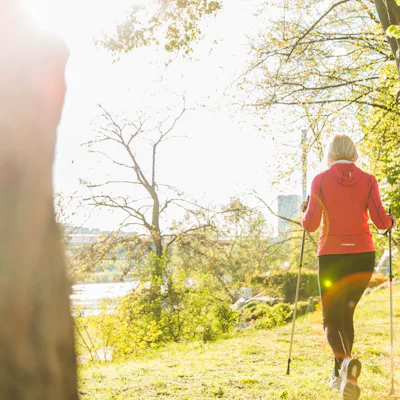 A woman does Nordic walking.