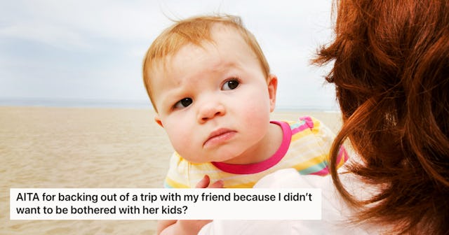 A baby looks quizzically over their redheaded mother's shoulder.