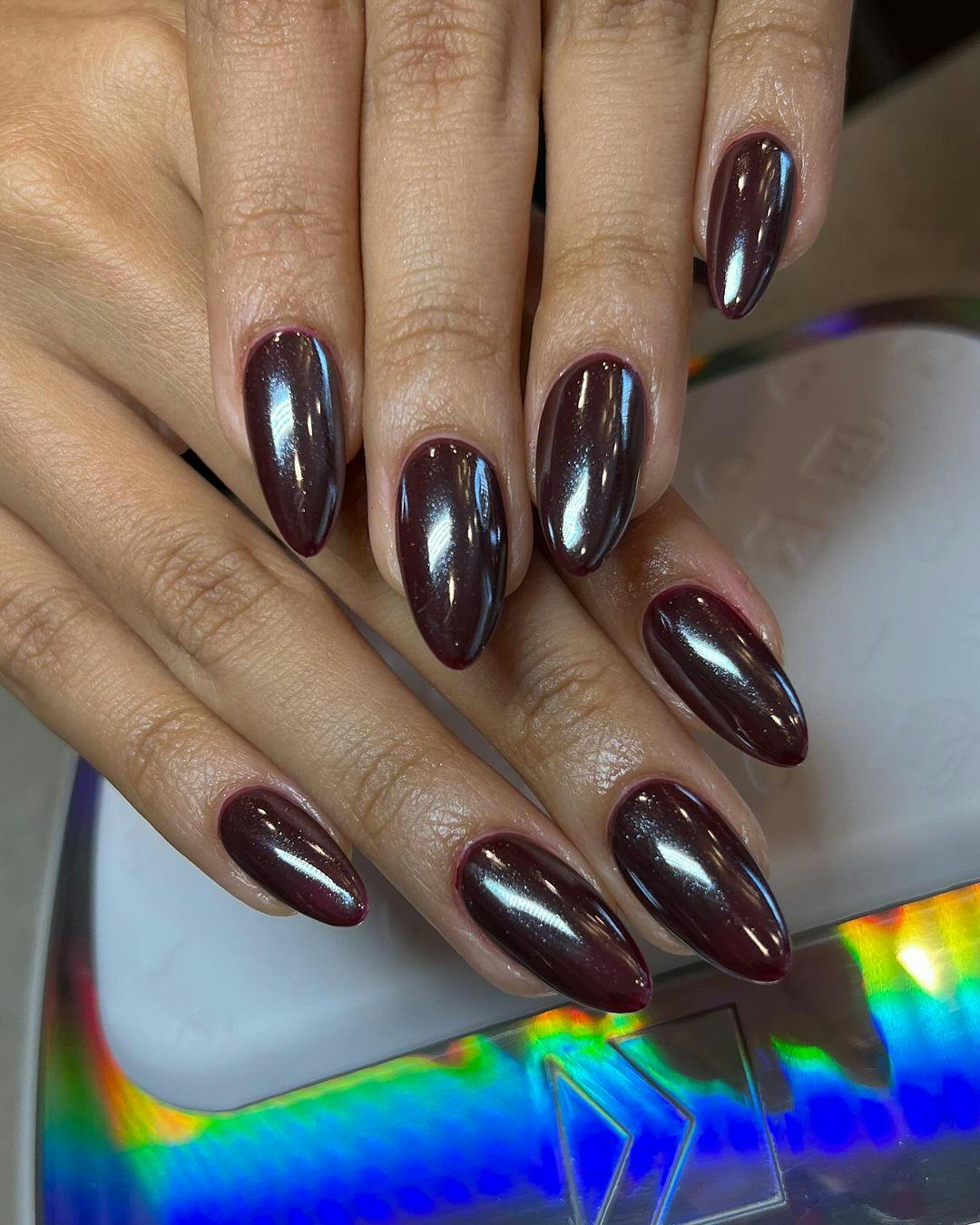 Try &ldquo;black cherry&rdquo; chrome nails for fall 2024.
