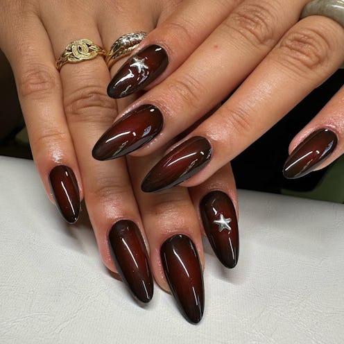 "Black cherry" nails are set to dominate fall 2024.