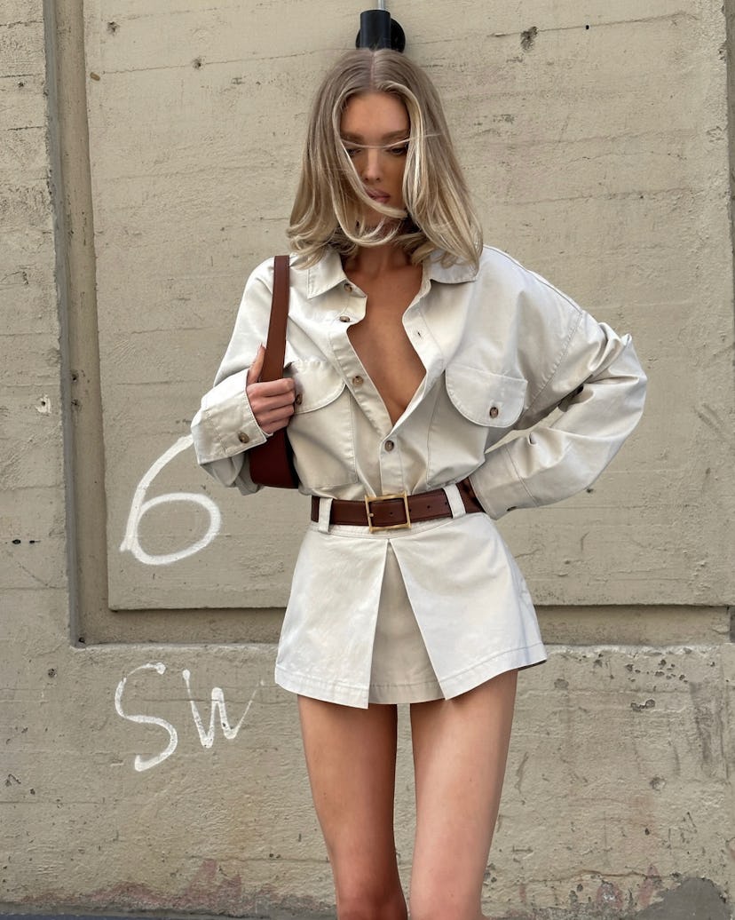Model Elsa Hosk wore a belted khaki coordinate set from her namesake label Helsa Studio.
