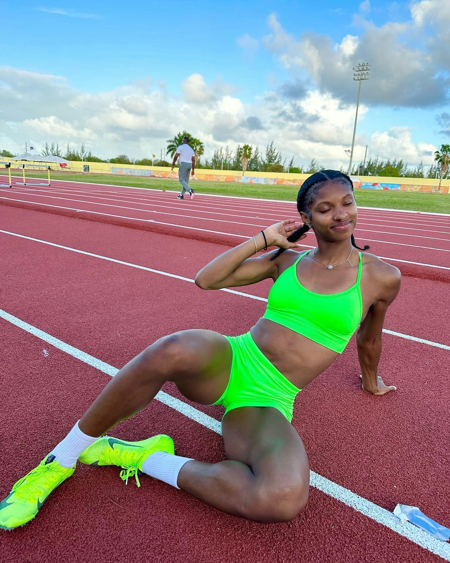 Olympian Masai Russell On Loving Her Curls & Her Go-To Hair Products