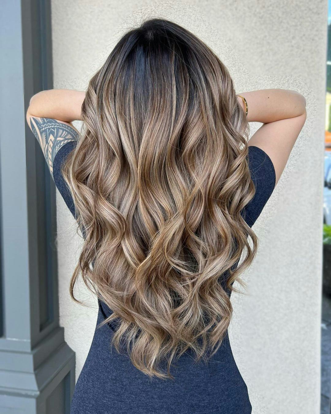 Low-maintenance bronde balayage is on-trend for fall 2024.