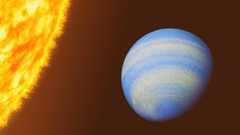 An illustration of exoplanet HD 189733 b and the side of its star. 