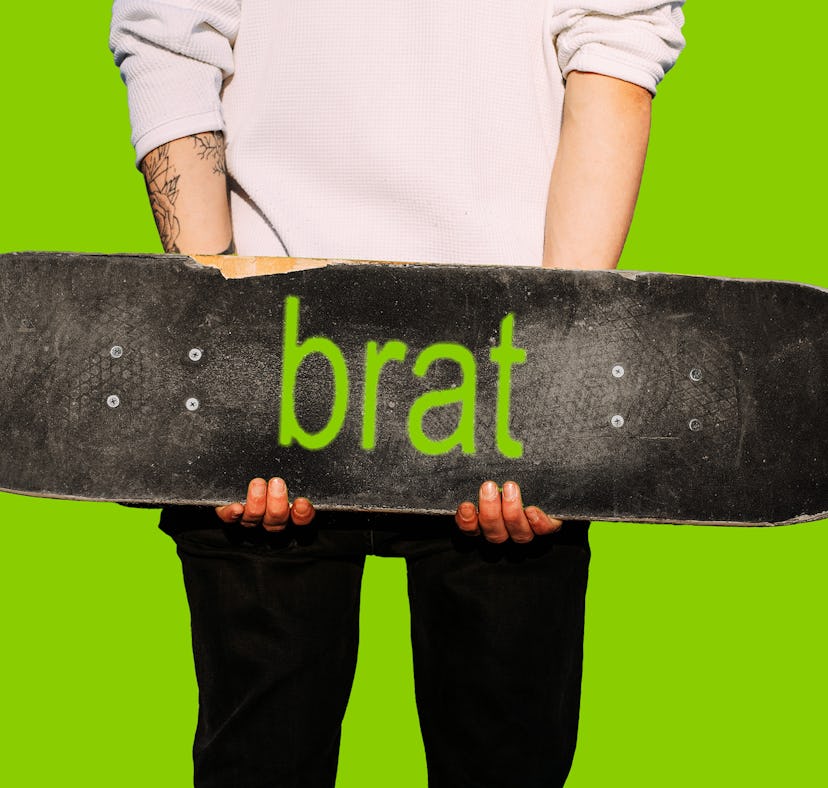 man holding a Brat skateboard, a reference to Charli XCX's album