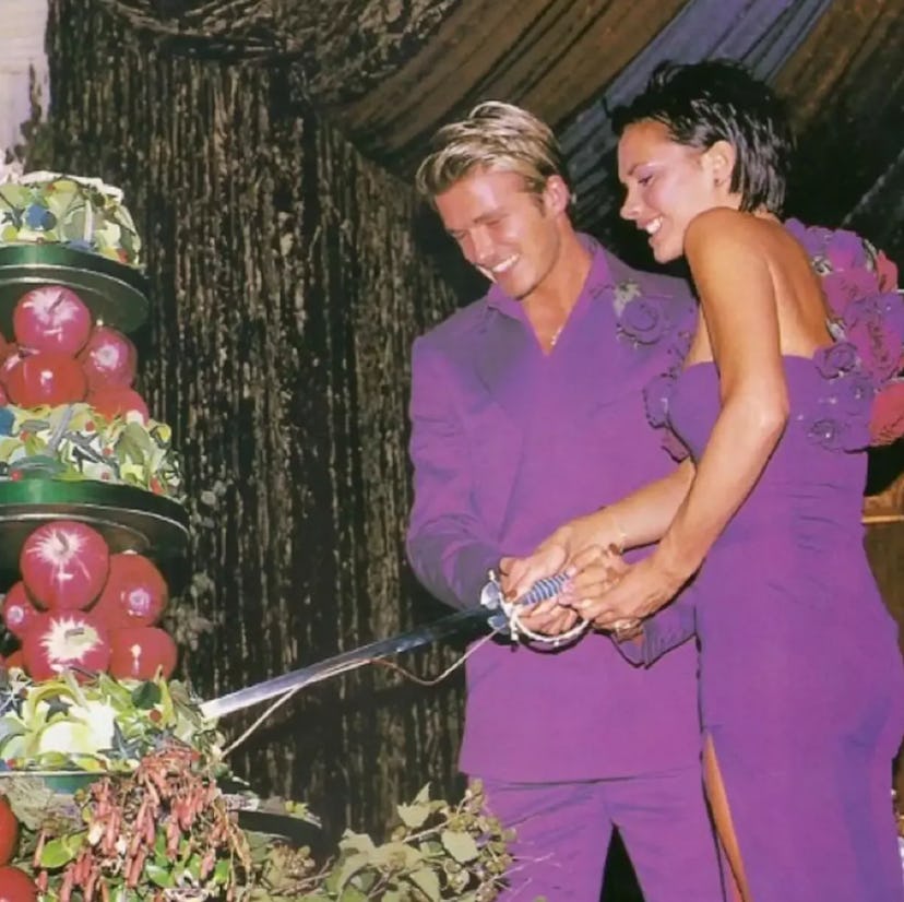 David and Victoria Beckham at their 1999 nuptials in matching purple wedding outfits.