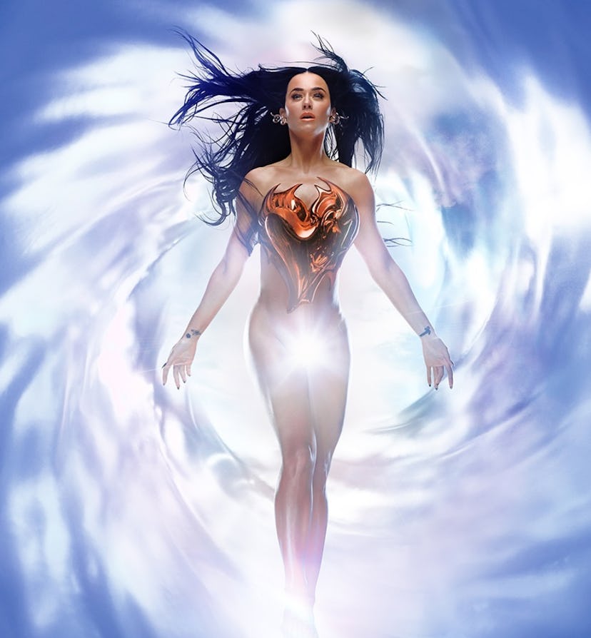 Katy Perry wore a micro bra with star-shaped pasties for her new album cover.