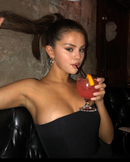 Selena Gomez's "dirty martini" olive nails are perfect for fall.