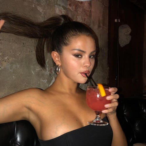 Selena Gomez’s “dirty martini” olive nails are perfect for fall.