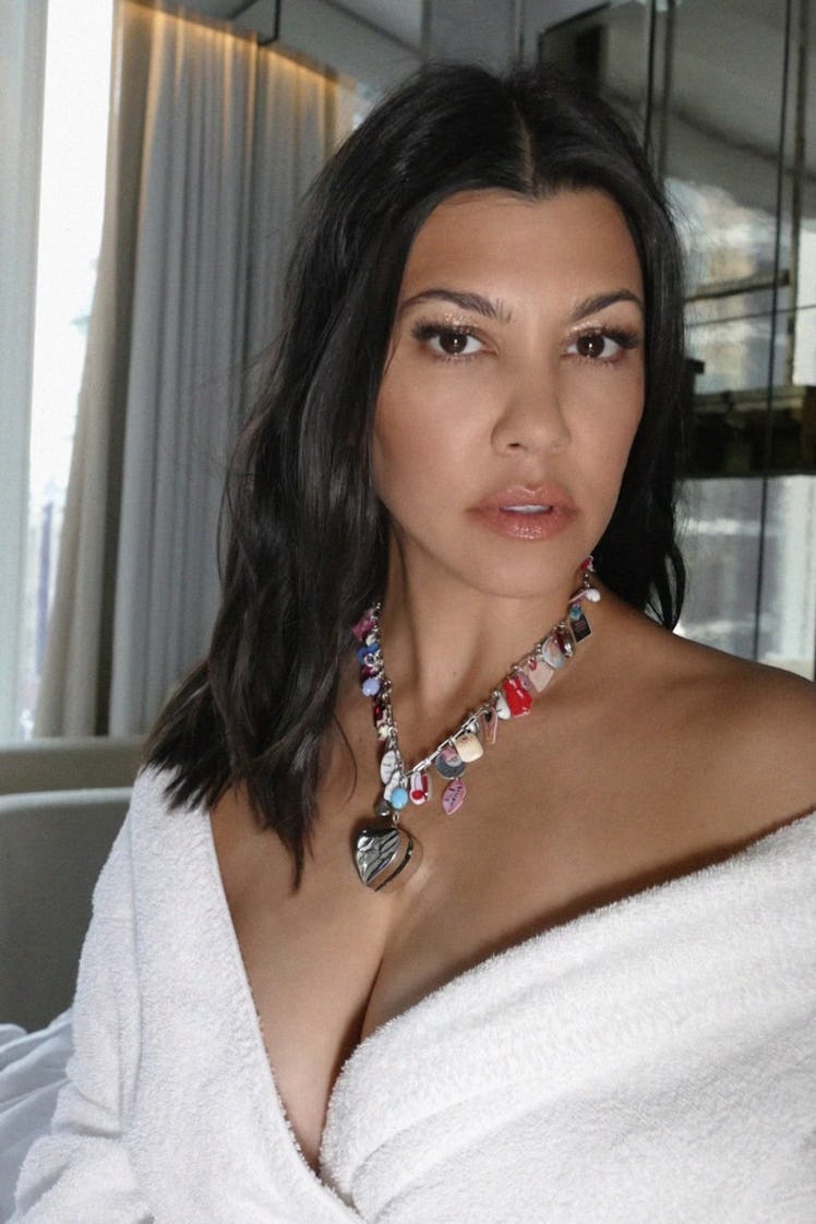 Kourtney Kardashian wearing the new Lemme x Haricot Vert charm necklace.