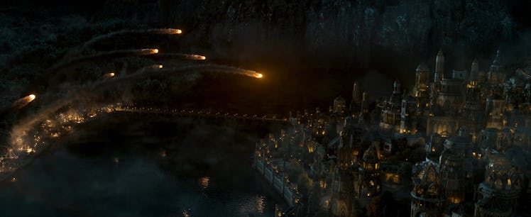 Flaming boulders soar through the air toward Eregion in 'The Lord of the Rings: The Rings of Power' ...