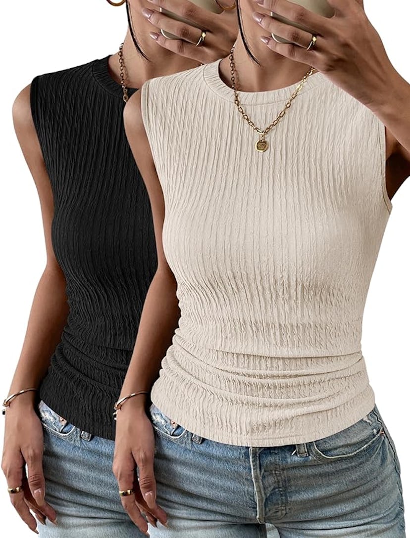 A model is showcasing two fitted sleeveless tops, one in black and the other in beige, paired with l...