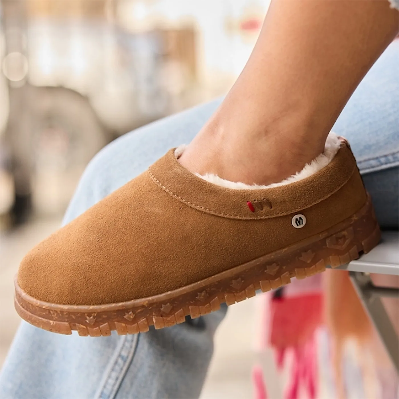minnetonka women's indoor outdoor slippers in the style neva, a tan clog