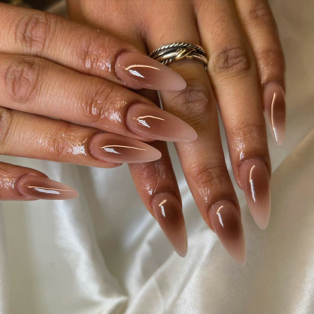 Brown aura nails are on-trend for fall 2024.