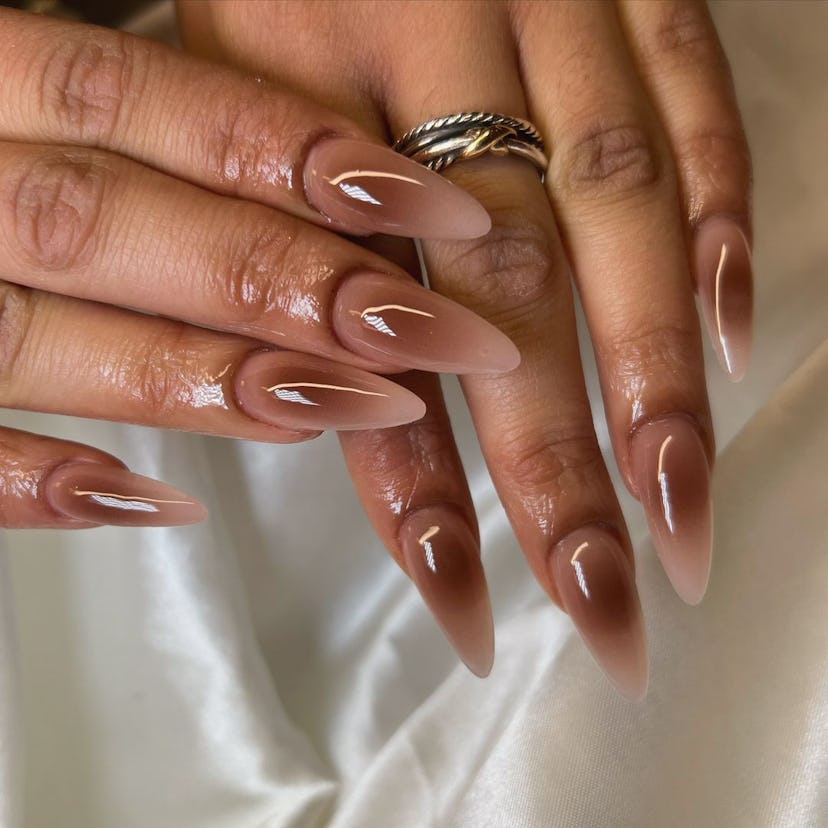 Brown aura nails are on-trend for fall 2024.