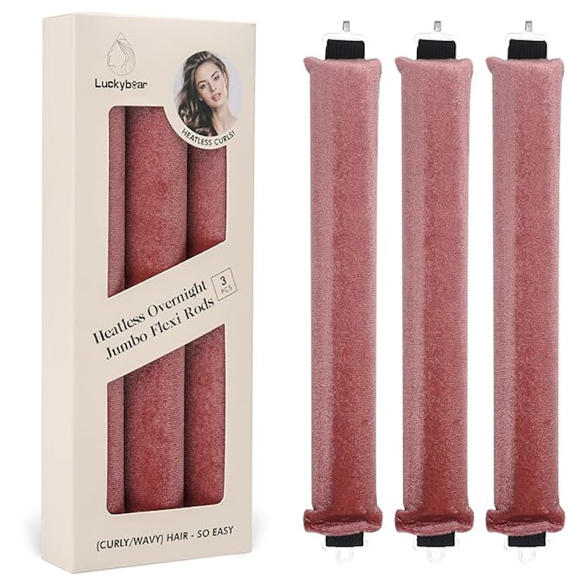 A box of three heatless jumbo flexi rods for styling curly or wavy hair, featuring a model on the pa...