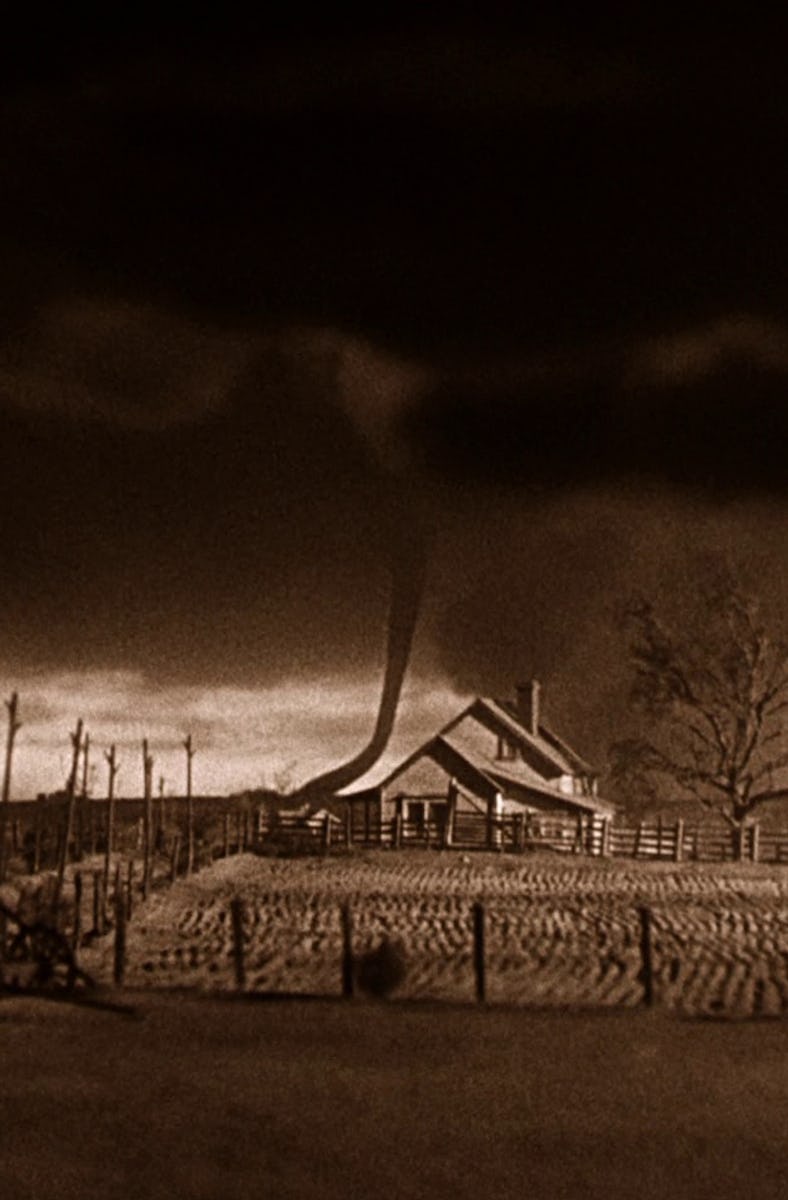 A tornado rages near a Kansas farm in 'The Wizard of Oz'