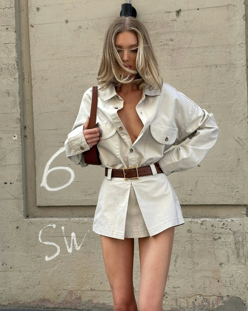 Model Elsa Hosk wore a belted khaki coordinate set from her namesake label Helsa Studio.