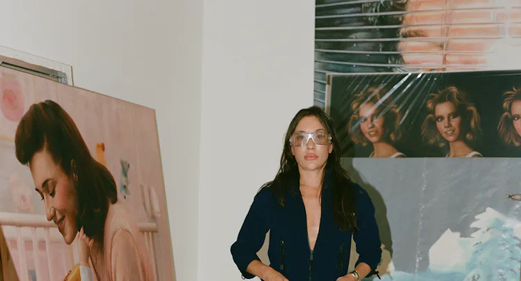Artist and gallerist Jamian Juliano-Villani at her studio in Brooklyn. Miu Miu top; Balenciaga panta...