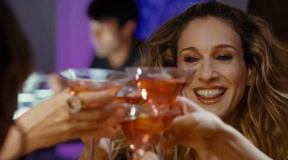 Carrie Bradshaw enjoys a Cosmopolitan. The character is canonically not a beer girl.
