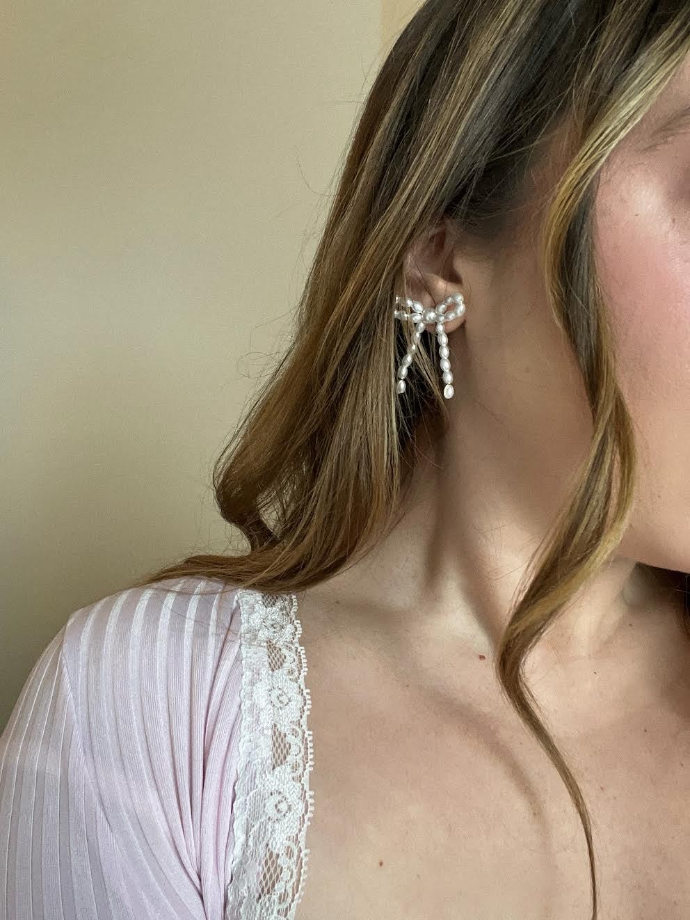 Ribbon jewelry is on-trend for fall 2024.