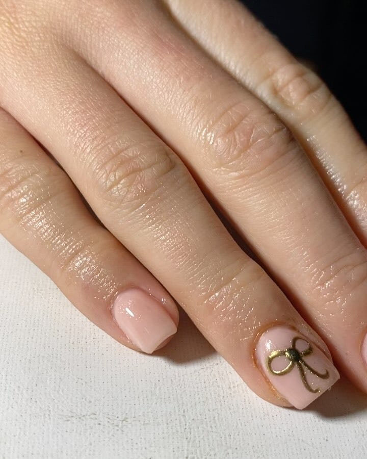 Blair Waldorf would love nails with gold chrome ribbon details.