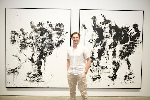 New York Rangers defenseman Jacob Trouba with his artwork, part of his first exhibit, "Leave Your Ma...