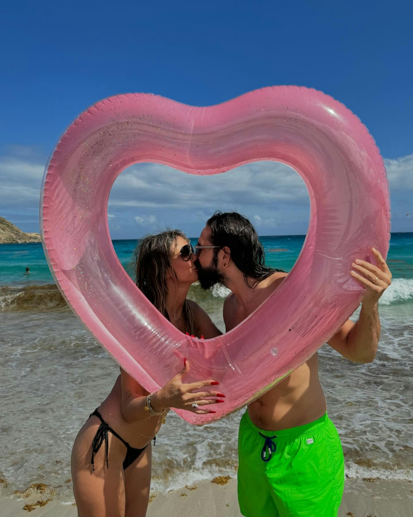 Heidi Klum wore the stringiest bikini on vacation with her husband.