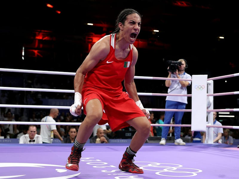 Algerian boxer Imane Khelif celebrates her victory in the women’s boxing 66-kilogram quarterfinal ma...