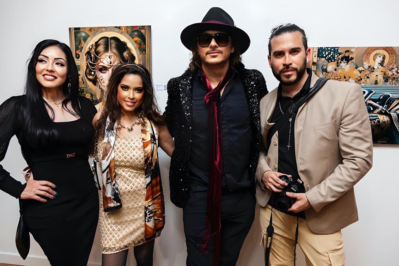 An unforgettable night at Anita Rodgers Gallery as Marko Stout poses with admirers of his innovative...