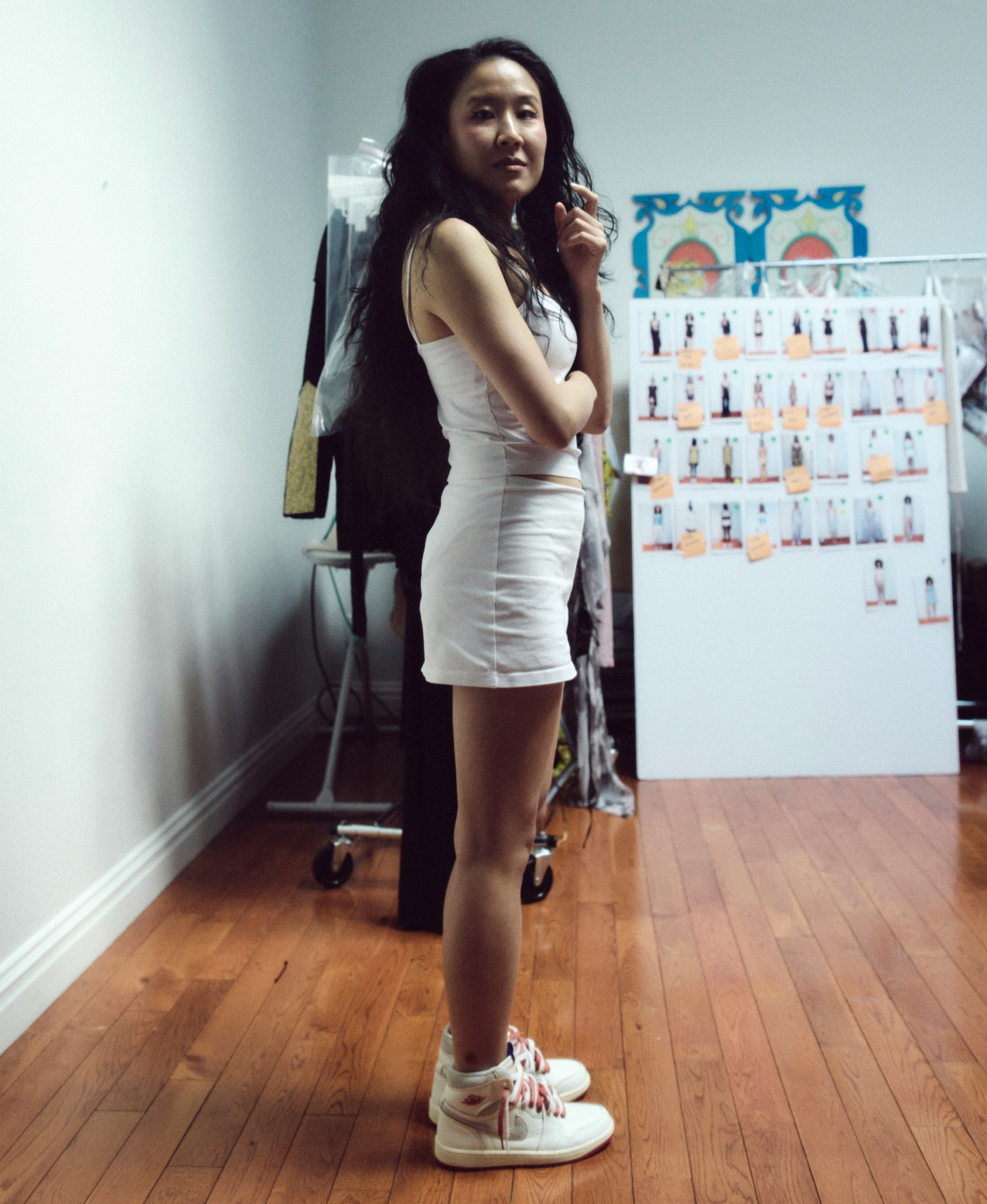 Designer Kim Shui wearing the Rare Airs backstage at NYFW.