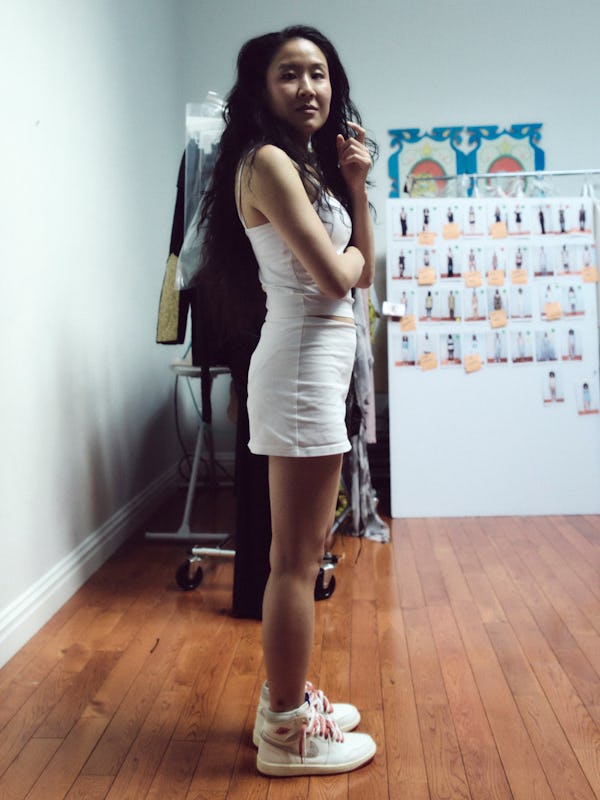 Designer Kim Shui wearing the Rare Airs backstage at NYFW.