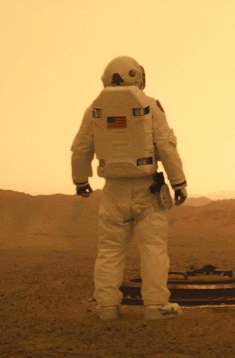 An astronaut stands on the dusty surface of Mars in 'Ad Astra'
