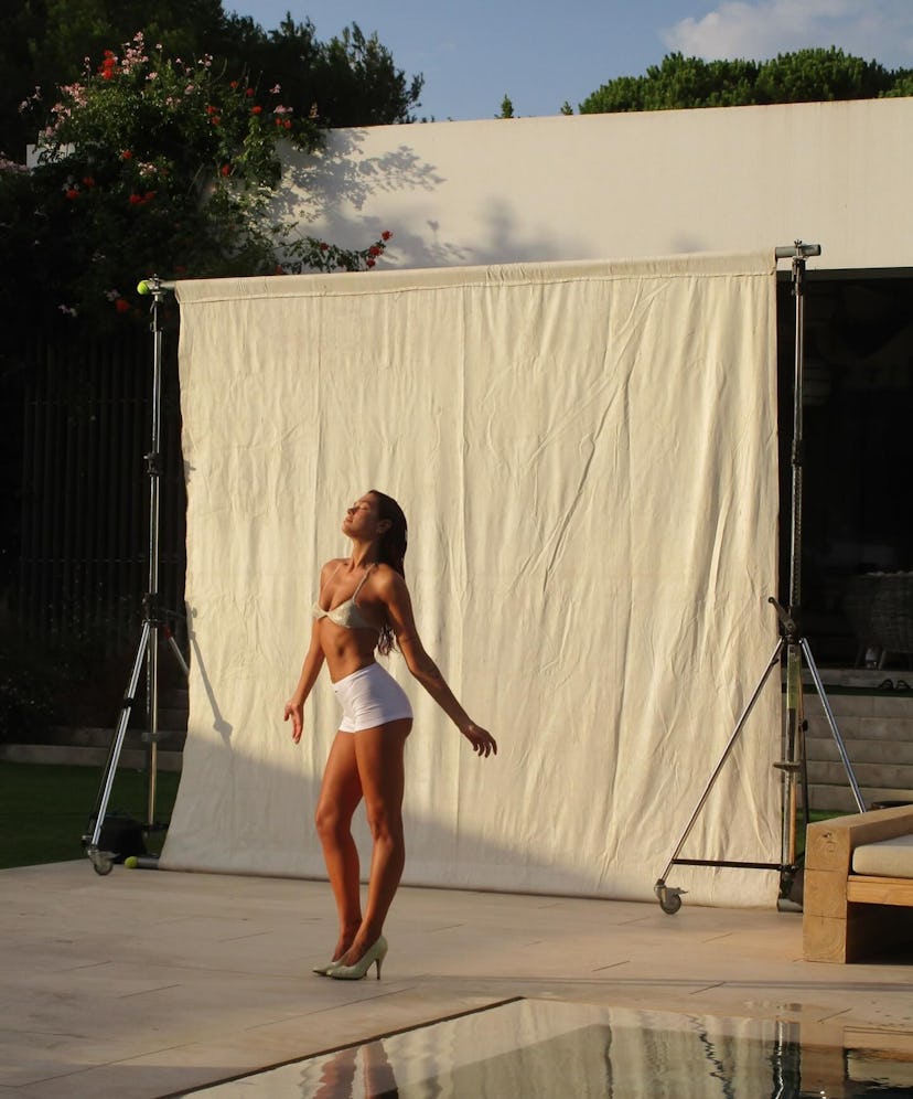 Dua Lipa stripped to her undies to promote her upcoming tour.