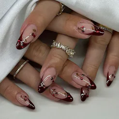 Here are 12 burgundy nail art art ideas for a "cherry mocha girl" fall.