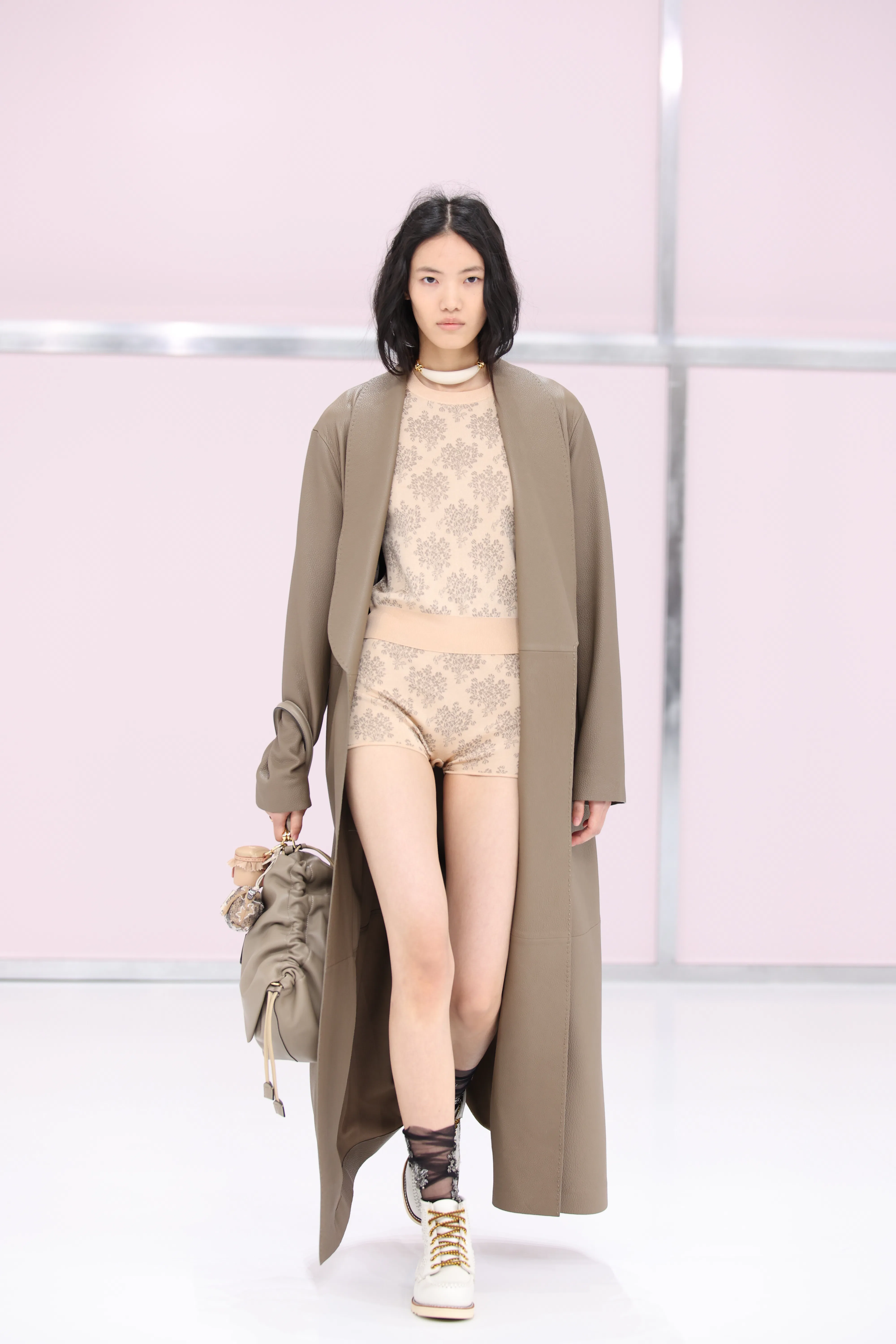 A model walks the runway at the Fendi fashion show during the Milan Womenswear Spring/Summer 2025 on...