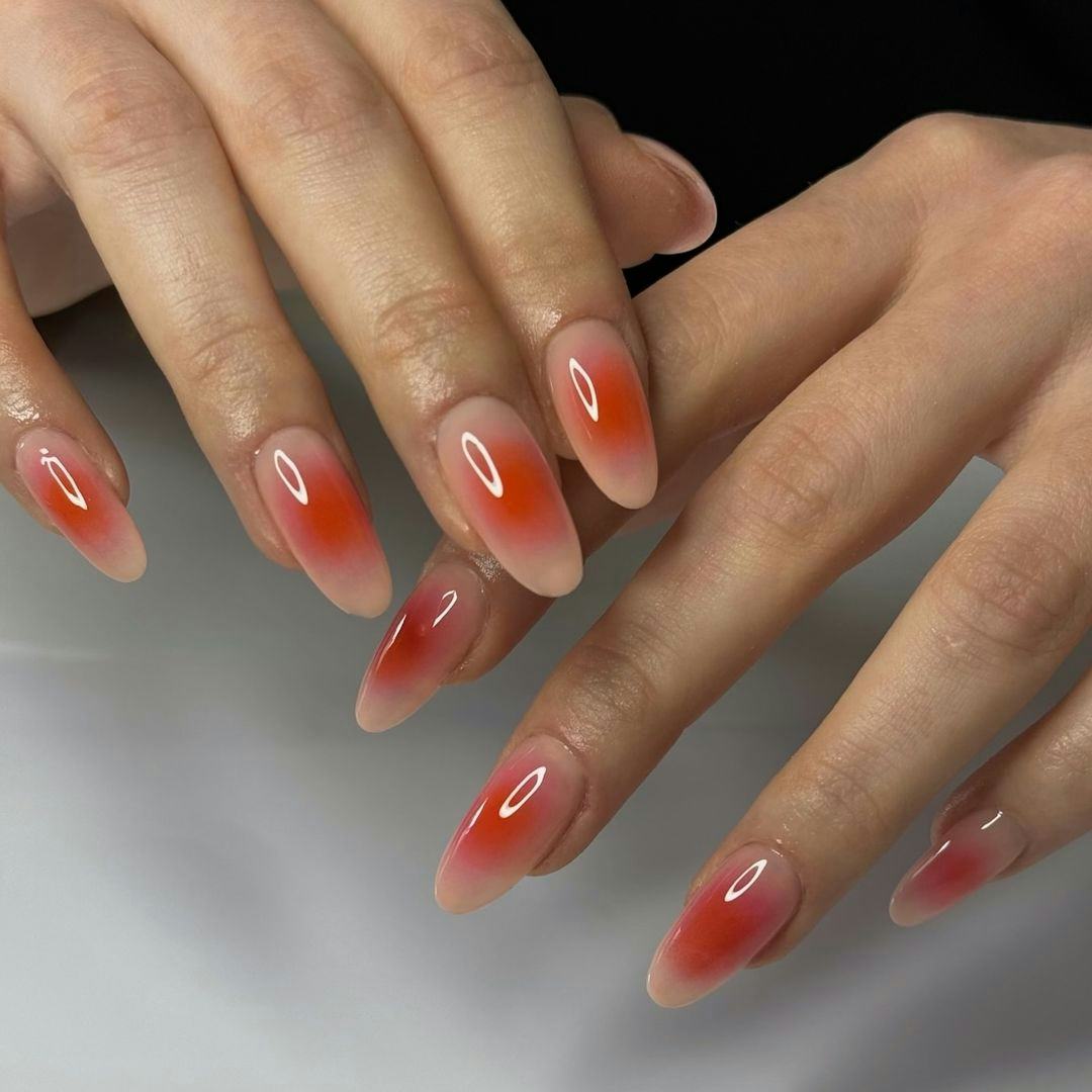 Leo would wear orange aura nails.