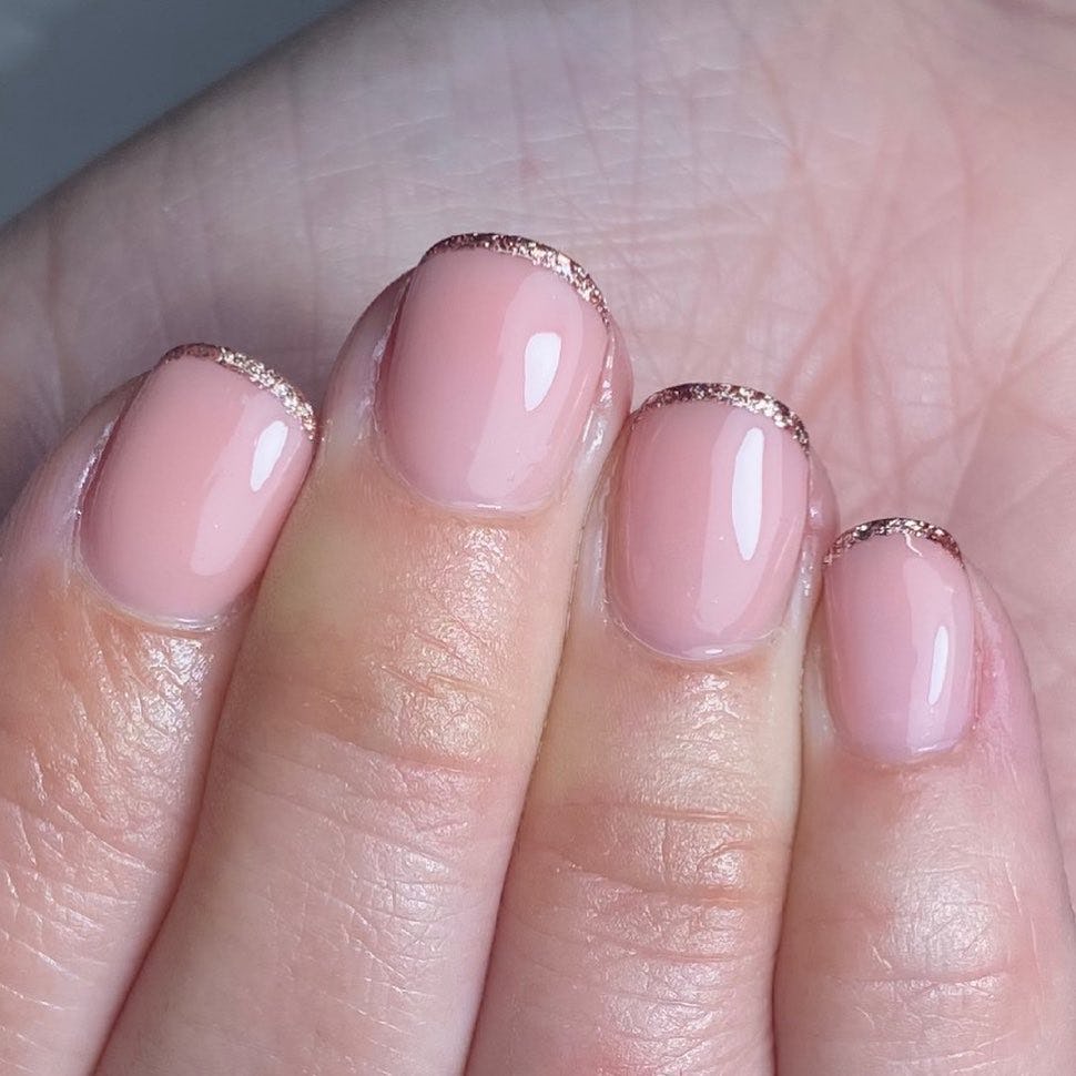 Try rose gold micro French tip nails.