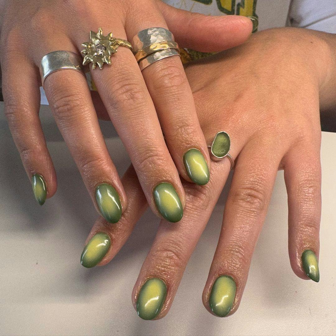 Taurus would wear green aura nails.